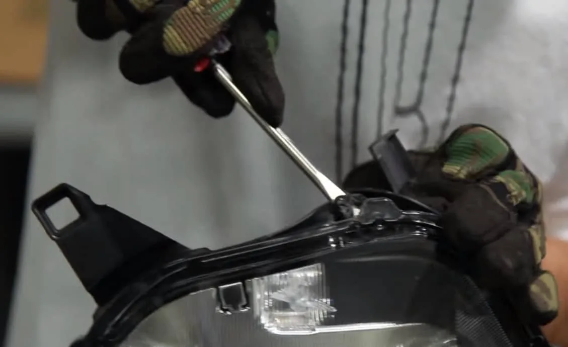 Reseal Headlights - Prying the Headlight